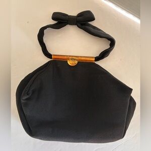 Vintage Elegant Black Silk Handbag with Ornate Gold Accent